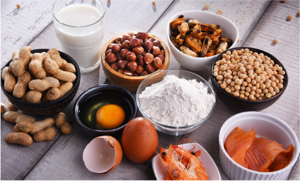 A table full of food that are common allergens. 